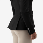 Waist view of tailored cut of black Anna Klose competition jacket for equestrian women
