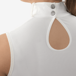 Neck close up of white competition top for equestrian women with silver Anna Klose logo closure buttons