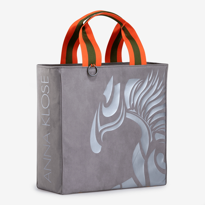 Horse riding equipment made of light gray vegan leather with silver logo and Anna Klose lettering