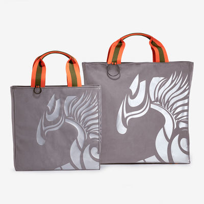 Two horse riding equipment bags made of light gray vegan leather with silver logo by Anna Klose Hamburg