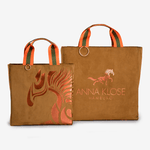 Two horse riding equipment bags made of brown vegan leather with rose golden logo by Anna Klose Hamburg