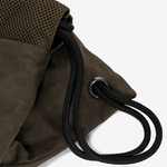 Detail image of the strap loop of a luxury vegan leather backpack