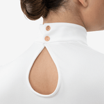 Neck close up of white competition shirt for equestrian women with rose golden Anna Klose logo buttons