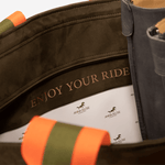 Close up of the lining of an olive green blue horse riding equipment bag with a personalized inscription