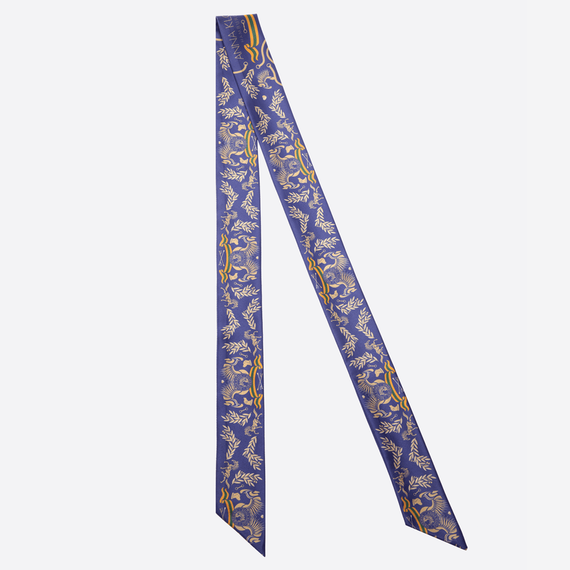 Blue golden Anna Klose twilly band made of satin with design print to use as a bracelet, belt or bag accessory  